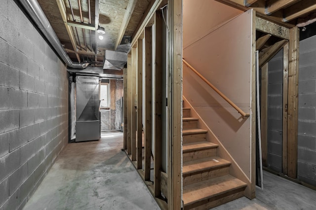 332 Waite Ave S, Saint Cloud, MN 56301 - below grade area featuring concrete block wall and stairway