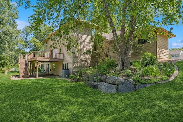 6233 Fernbrook Ln N, Maple Grove, MN 55311 - rear view of house featuring stairway, a wooden deck, and a yard