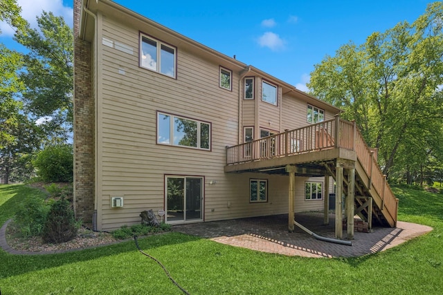 6233 Fernbrook Ln N, Maple Grove, MN 55311 - back of property with a deck, a yard, a patio area, and stairway