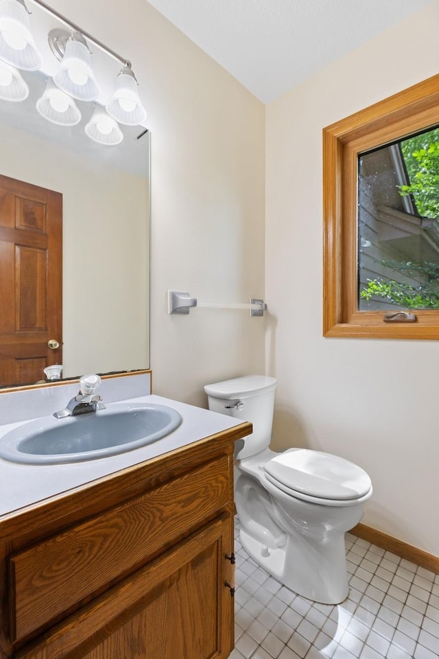 6233 Fernbrook Ln N, Maple Grove, MN 55311 - bathroom with vanity and tile patterned floors