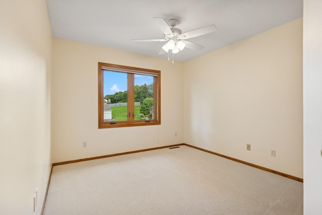 6233 Fernbrook Ln N, Maple Grove, MN 55311 - carpeted spare room with ceiling fan and baseboards