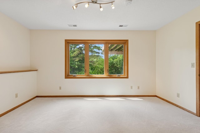 6233 Fernbrook Ln N, Maple Grove, MN 55311 - carpeted empty room with baseboards and a smoke detector