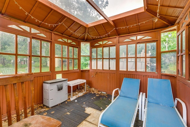 3220 Vine St, Cambridge, MN 55008 - sunroom / solarium featuring a skylight, a deck, and carpet floors