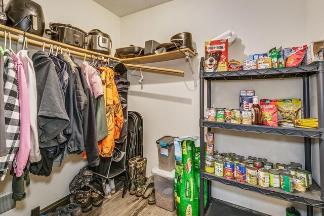 3220 Vine St, Cambridge, MN 55008 - spacious closet featuring wood finished floors