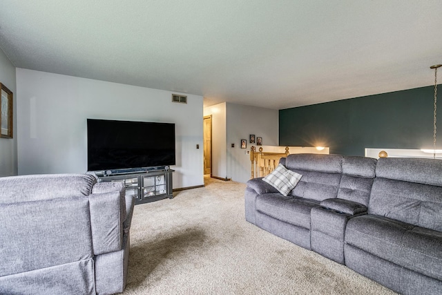 3220 Vine St, Cambridge, MN 55008 - carpeted living room featuring baseboards