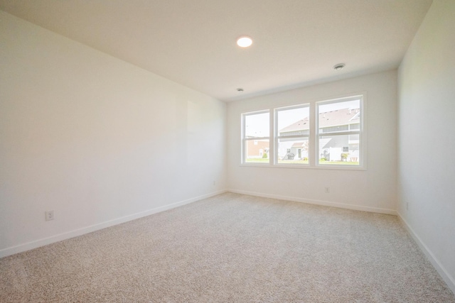 14526 111th Ave E, Dayton, MN 55369 - empty room with light carpet, baseboards, and recessed lighting