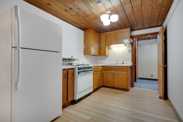 895 Humboldt Ave W, Saint Paul, MN 55118 - kitchen featuring white appliances, wood ceiling, light countertops, light wood-style floors, and brown cabinetry