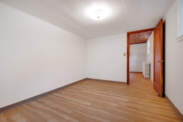 895 Humboldt Ave W, Saint Paul, MN 55118 - unfurnished room with radiator and light wood-style flooring
