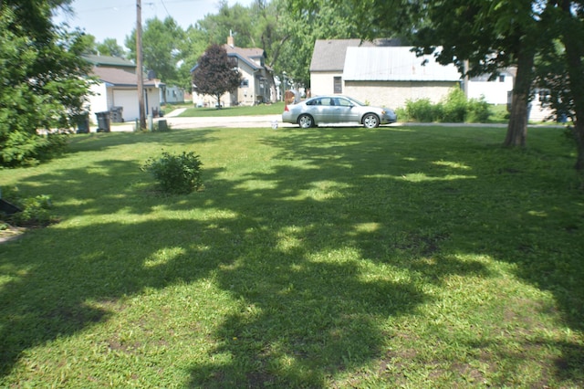 13 S St, Morris, MN 56267 - view of green lawn with a residential view