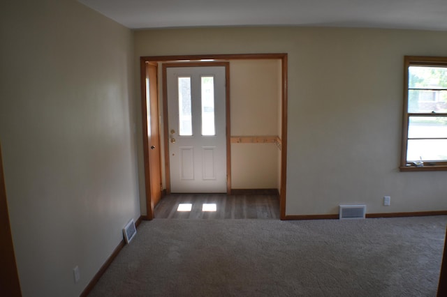 13 S St, Morris, MN 56267 - entrance foyer with carpet floors and baseboards