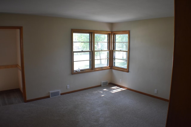 13 S St, Morris, MN 56267 - unfurnished room with carpet floors and baseboards