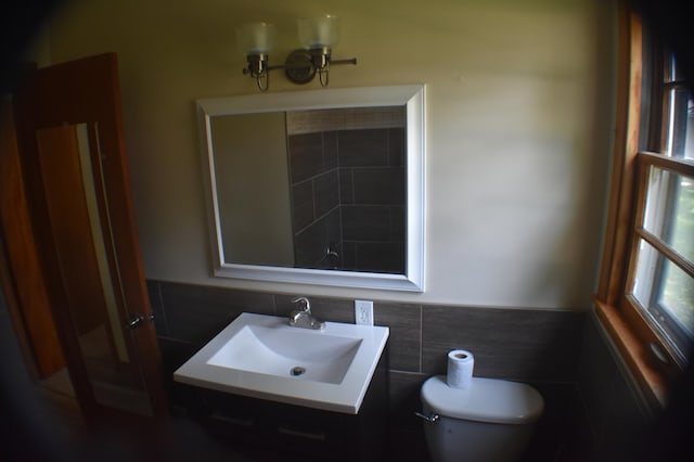 13 S St, Morris, MN 56267 - bathroom with tile walls and vanity