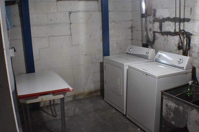 13 S St, Morris, MN 56267 - laundry room featuring separate washer and dryer and concrete block wall