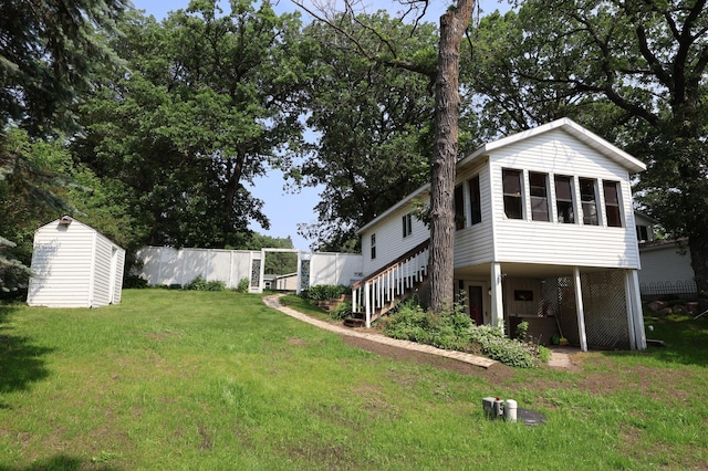10196 48th St, Clear Lake, MN 55319 - view of green lawn featuring stairway and a sunroom