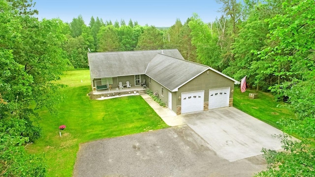 11672 147th Ave, Straight River Twp, MN 56464 - view of front of house with a front lawn, an attached garage, and driveway
