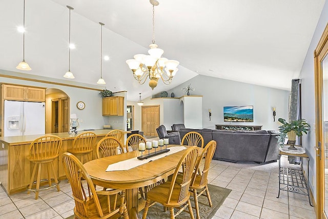 11672 147th Ave, Straight River Twp, MN 56464 - dining space with lofted ceiling, light tile patterned floors, a chandelier, and arched walkways