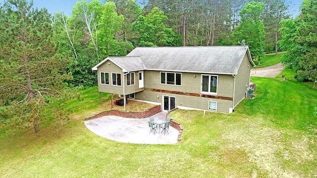 11672 147th Ave, Straight River Twp, MN 56464 - back of house featuring a patio area, a lawn, and roof with shingles