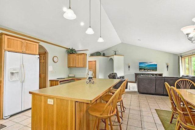 11672 147th Ave, Straight River Twp, MN 56464 - kitchen with white refrigerator with ice dispenser, light tile patterned floors, vaulted ceiling, a center island, and arched walkways
