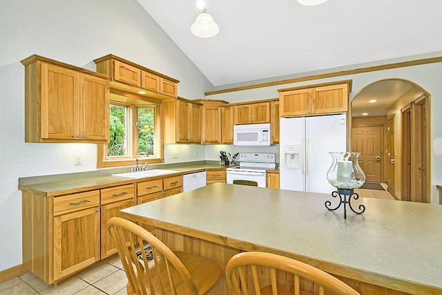 11672 147th Ave, Straight River Twp, MN 56464 - kitchen with white appliances, a kitchen bar, arched walkways, light tile patterned floors, and high vaulted ceiling