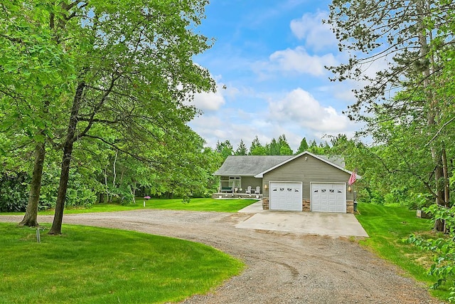 11672 147th Ave, Straight River Twp, MN 56464 - view of front of home featuring dirt driveway, a front lawn, and a garage