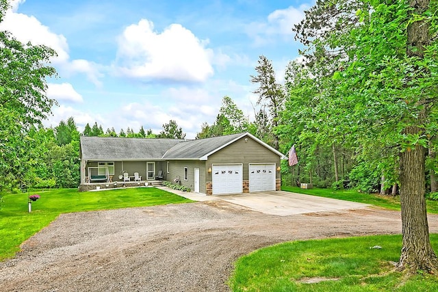 11672 147th Ave, Straight River Twp, MN 56464 - view of front of home featuring driveway, an attached garage, and a front yard
