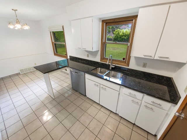 8337 80th St S, Cottage Grove, MN 55016 - kitchen featuring dishwasher, a sink, white cabinetry, and healthy amount of natural light