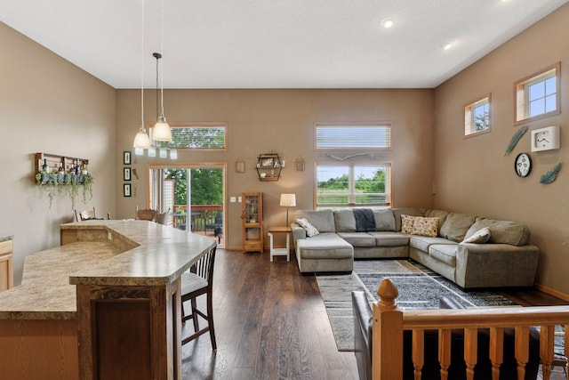 2936 18th Ave E, Shakopee, MN 55379 - living area featuring plenty of natural light, dark wood-style flooring, and recessed lighting