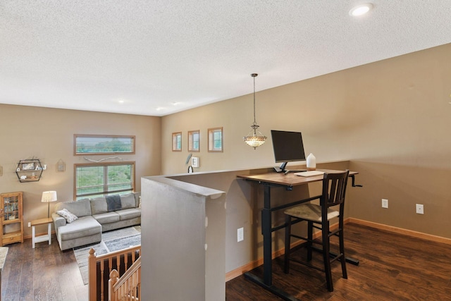 2936 18th Ave E, Shakopee, MN 55379 - bar featuring dark wood-style flooring, a textured ceiling, recessed lighting, and hanging light fixtures