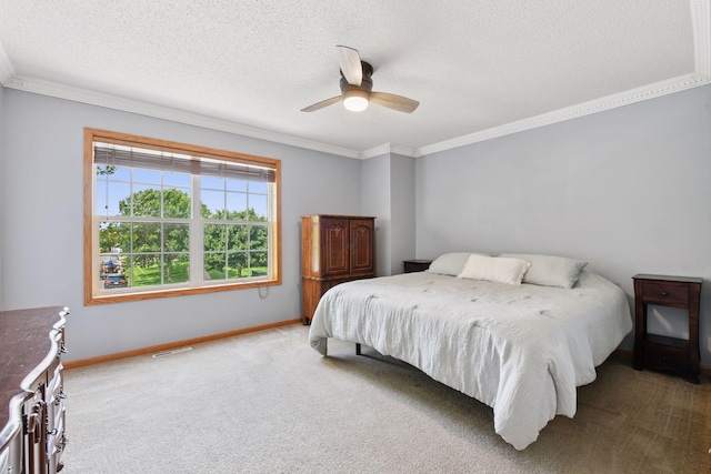 2936 18th Ave E, Shakopee, MN 55379 - bedroom with ornamental molding, carpet floors, a textured ceiling, and a ceiling fan