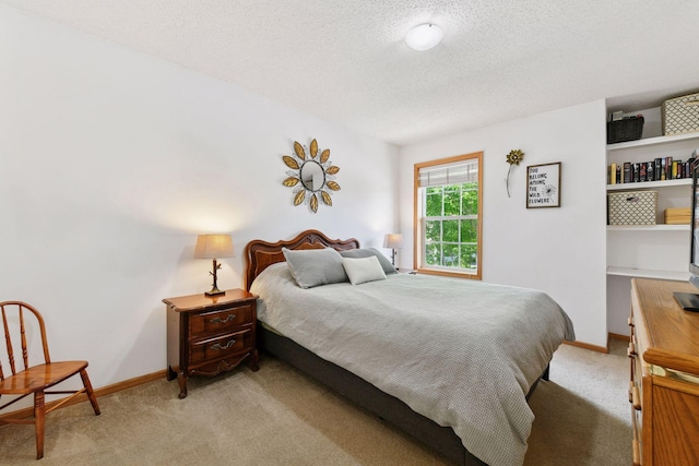 2936 18th Ave E, Shakopee, MN 55379 - bedroom featuring light colored carpet and a textured ceiling