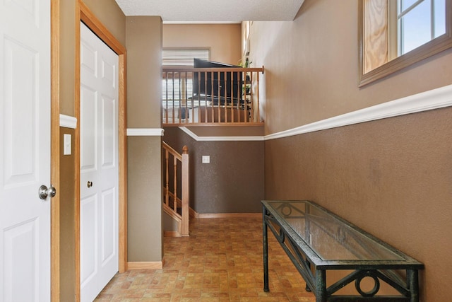 2936 18th Ave E, Shakopee, MN 55379 - staircase with brick patterned flooring and baseboards