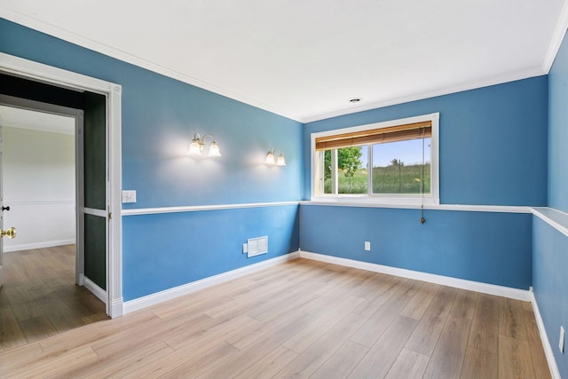 2936 18th Ave E, Shakopee, MN 55379 - unfurnished room with wood finished floors and ornamental molding