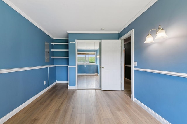 2936 18th Ave E, Shakopee, MN 55379 - empty room featuring wood finished floors and crown molding