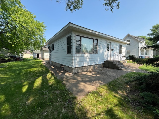 609 11th St N, Benson, MN 56215 - view of front of home with a front yard