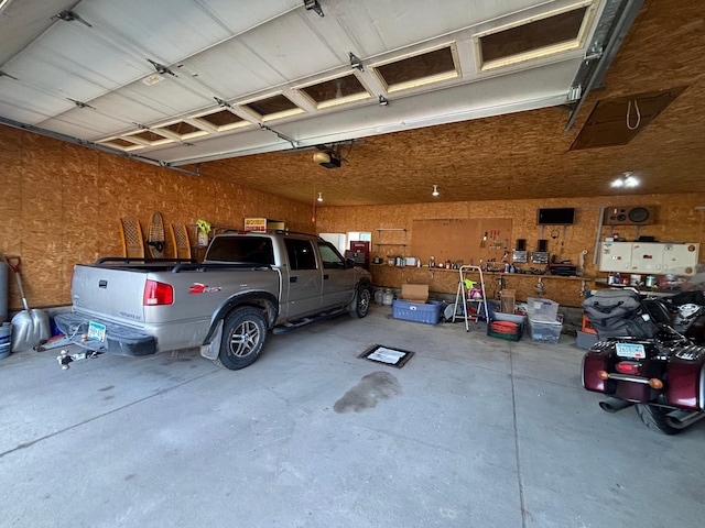 609 11th St N, Benson, MN 56215 - garage featuring a garage door opener