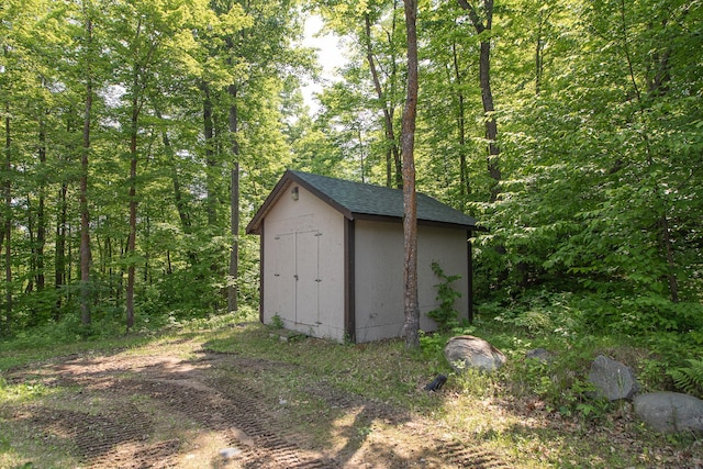 7916 Little Thunder Dr NE, Remer, MN 56672 - view of shed with a forest view