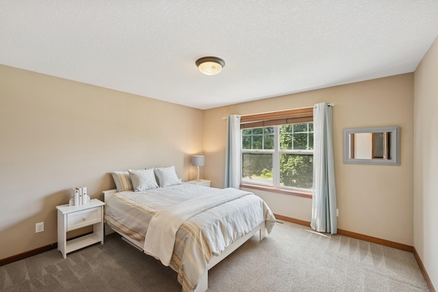 1020 Bliss Ln, Bloomington, MN 55431 - bedroom featuring dark carpet and baseboards