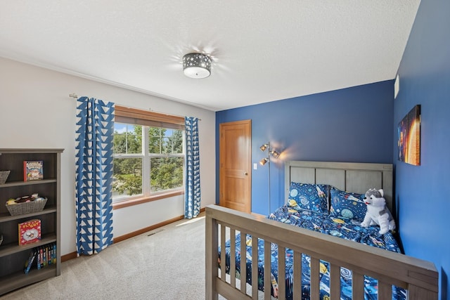 1020 Bliss Ln, Bloomington, MN 55431 - bedroom featuring carpet floors and a textured ceiling