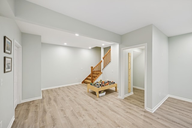 1020 Bliss Ln, Bloomington, MN 55431 - finished basement with light wood-style floors, stairs, and recessed lighting