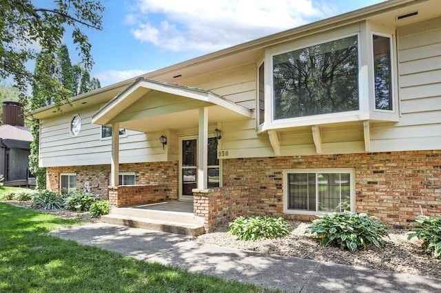 930 Minekahda Pl, Owatonna, MN 55060 - entrance to property featuring brick siding