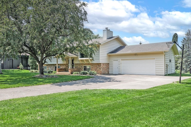 930 Minekahda Pl, Owatonna, MN 55060 - view of front facade featuring a garage, driveway, a chimney, a front lawn, and brick siding
