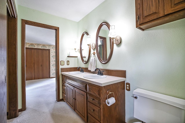 930 Minekahda Pl, Owatonna, MN 55060 - bathroom featuring toilet and double vanity