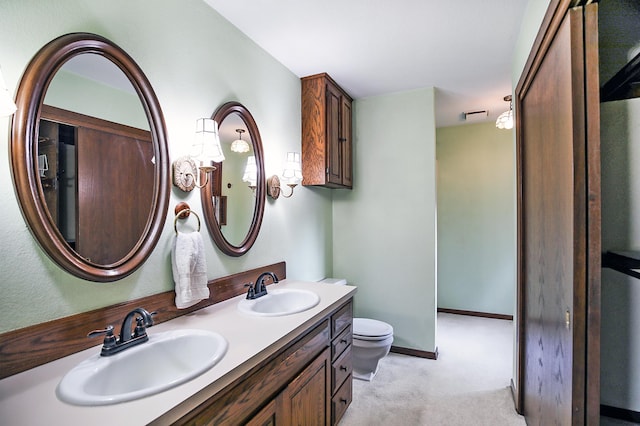 930 Minekahda Pl, Owatonna, MN 55060 - bathroom with double vanity and toilet