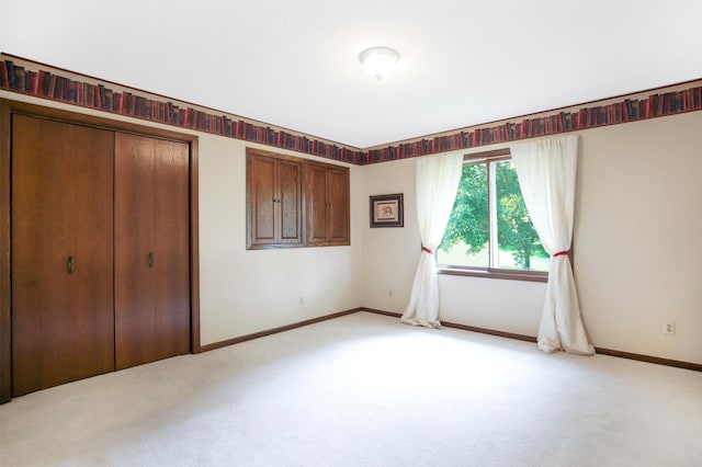 930 Minekahda Pl, Owatonna, MN 55060 - unfurnished bedroom featuring light carpet and a closet