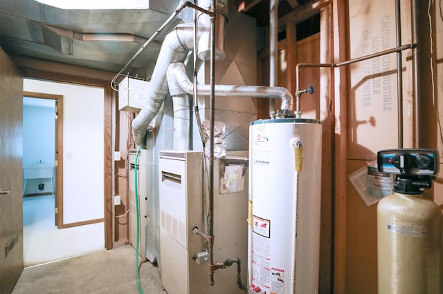 930 Minekahda Pl, Owatonna, MN 55060 - utility room with gas water heater and a sink