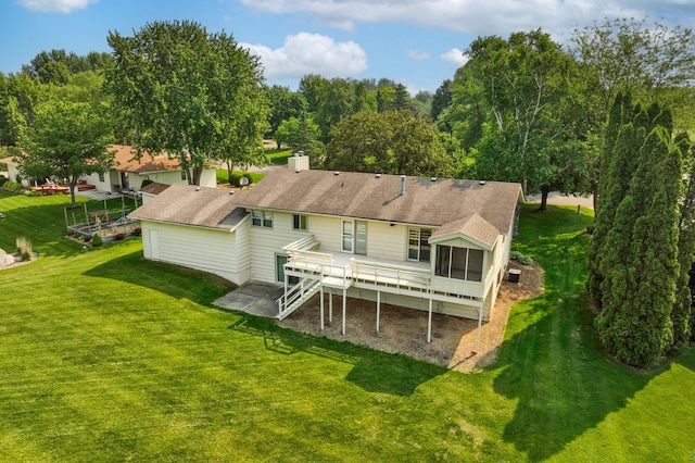 930 Minekahda Pl, Owatonna, MN 55060 - rear view of house featuring a deck, a lawn, and stairs