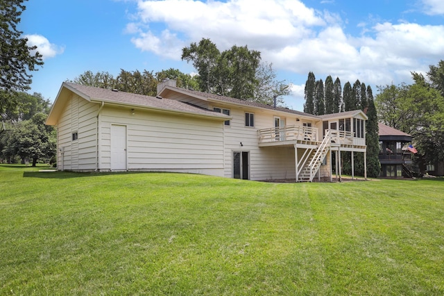 930 Minekahda Pl, Owatonna, MN 55060 - rear view of property with stairway, a wooden deck, a lawn, and a chimney