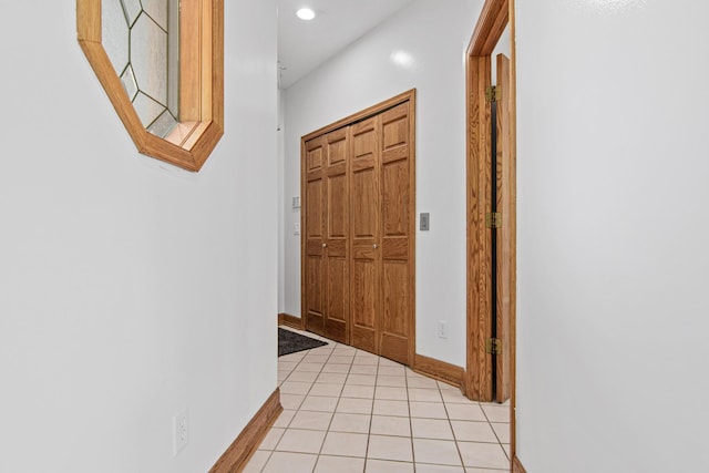 3817 Dunbar Ct N, Brooklyn Park, MN 55443 - corridor with light tile patterned flooring and recessed lighting