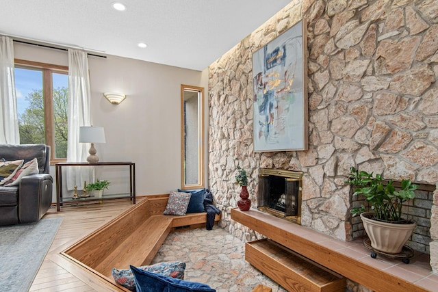 3817 Dunbar Ct N, Brooklyn Park, MN 55443 - living area featuring a fireplace and recessed lighting