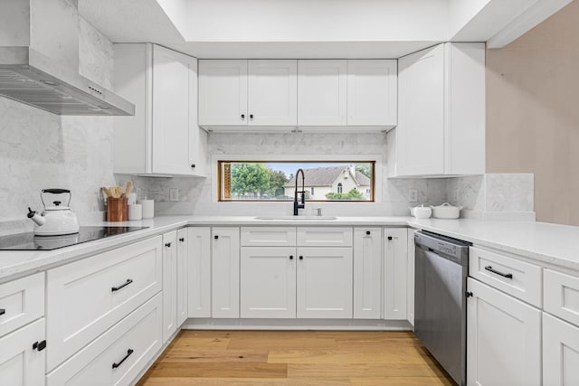3817 Dunbar Ct N, Brooklyn Park, MN 55443 - kitchen featuring stainless steel dishwasher, wall chimney exhaust hood, black electric stovetop, decorative backsplash, and light countertops